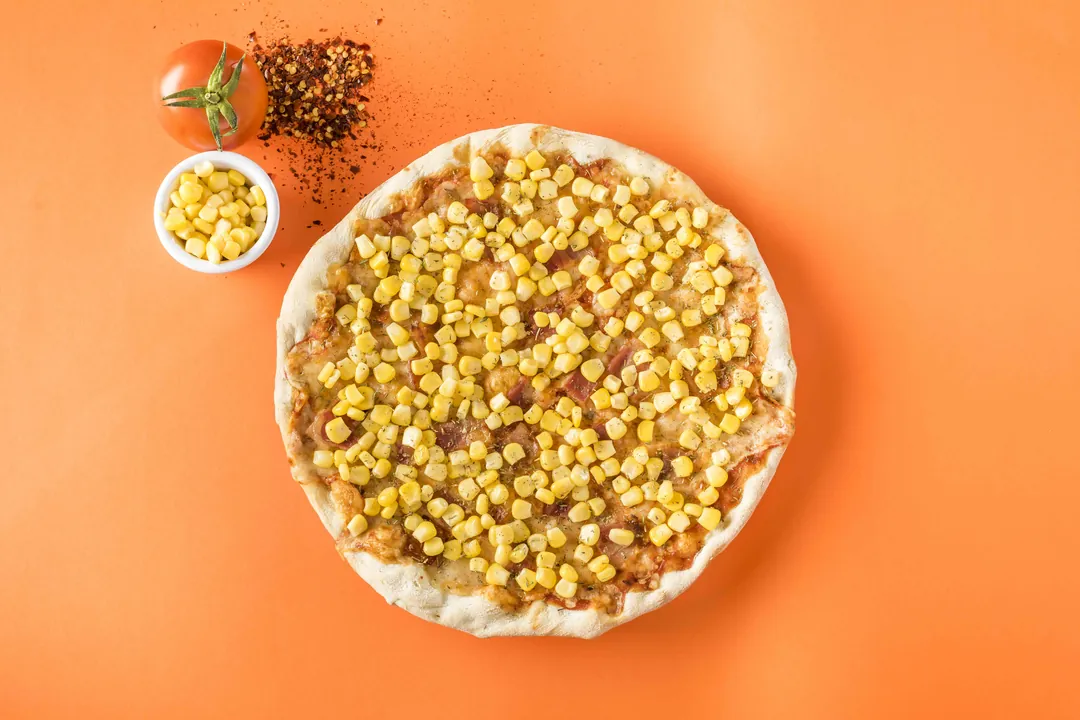Pizza Maíz y Tocineta Tradicional.